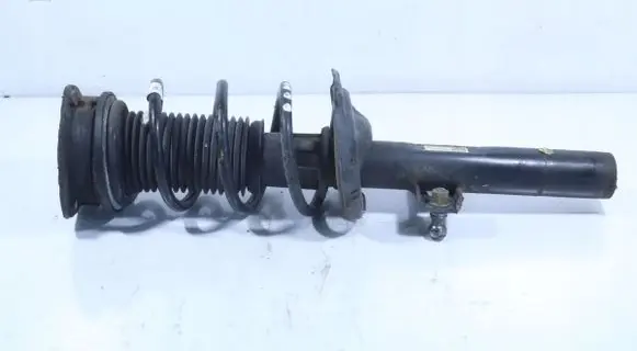 Skoda Scala Front shock absorber with coil spring 2Q0413031DC