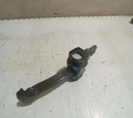 Front door check strap stopper