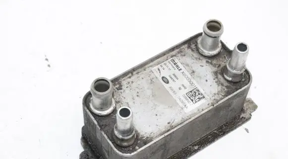 Jaguar XJ X351 Engine oil radiator AW837A095AA