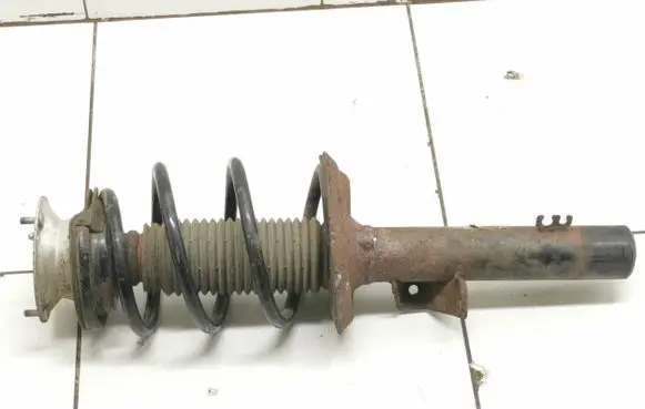Front shock absorber with coil spring