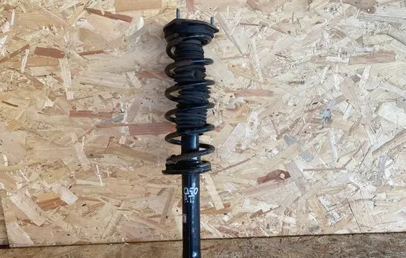 Infiniti Q50 Rear shock absorber with coil spring 562104GE0C
