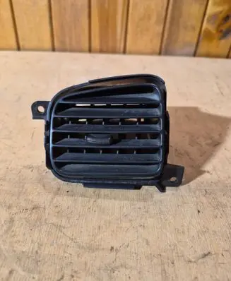 Mazda 323 Dash center air vent grill B25FGM932 1998615 PPT20SA2