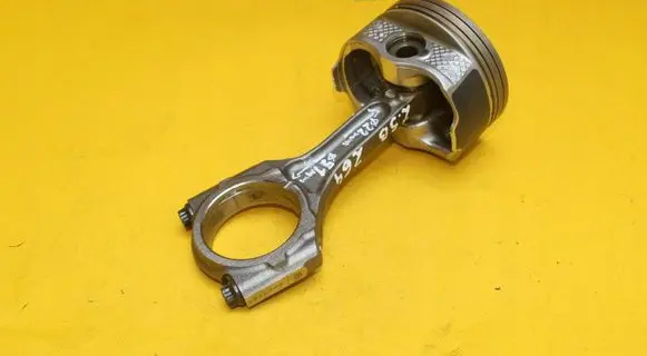 Piston with connecting rod