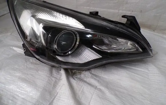 Opel Astra J Headlight/headlamp 13281277