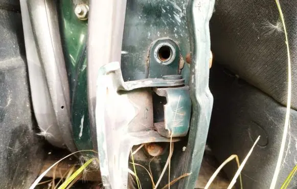 Subaru Legacy Rear door lower hinge