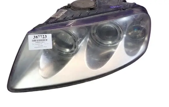 Volkswagen Touareg I Headlight/headlamp 7L6941015BK