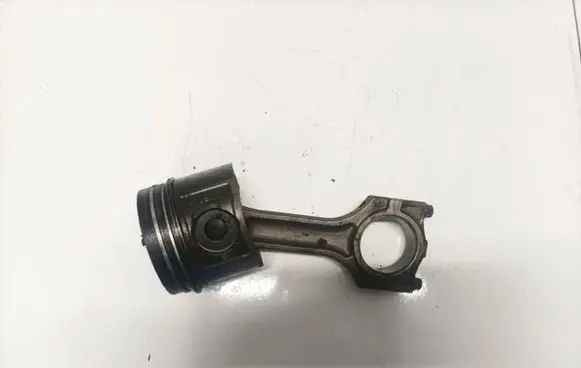 Piston with connecting rod
