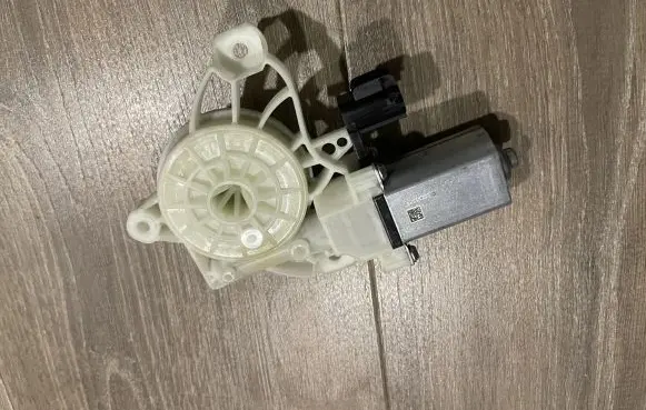 Front door window regulator motor