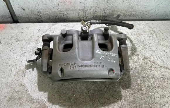 Jeep Grand Cherokee WL Front brake caliper 68338904AA