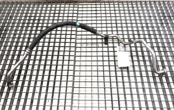 Suzuki Swift I Air conditioning (A/C) pipe/hose 9571062J11