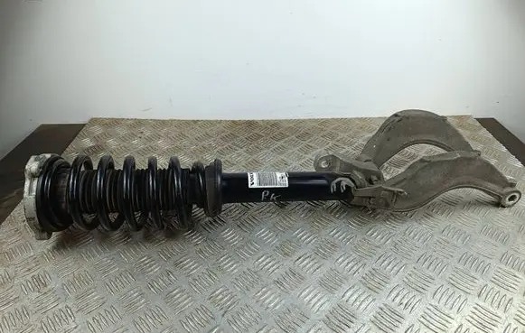 Volvo XC90 Front shock absorber with coil spring 31658004