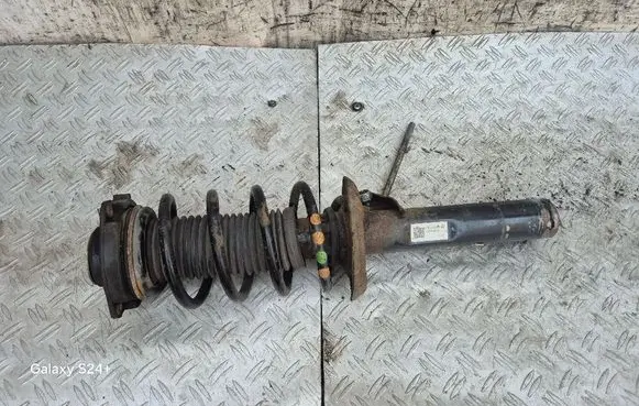 Volkswagen PASSAT B7 Front shock absorber with coil spring 3C0413031AT