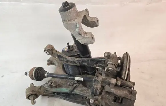 Rear wheel hub spindle/knuckle