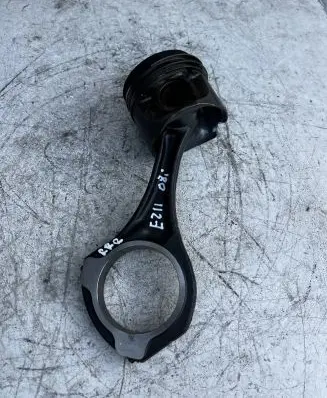 Piston with connecting rod