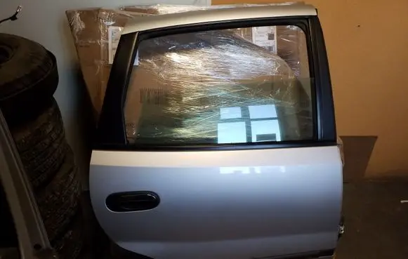 Nissan Almera Tino Rear door OEM