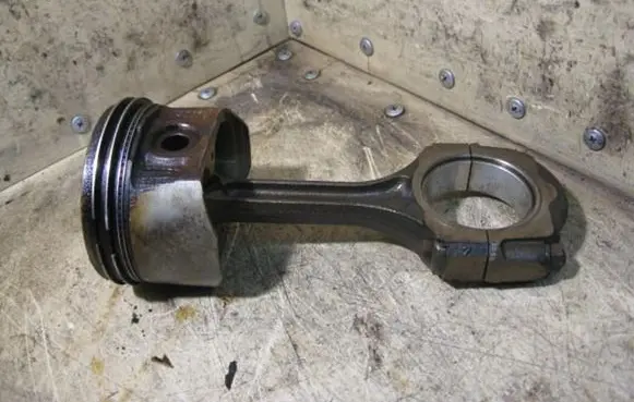 Piston with connecting rod