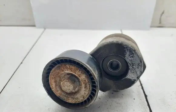 Opel Meriva A Generator/alternator belt tensioner 55185074AX 55185074