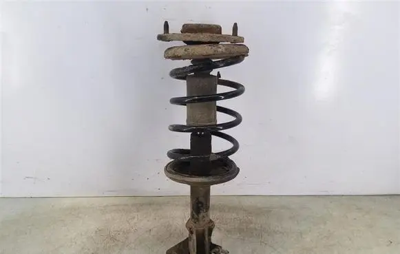Mitsubishi Space Star Front shock absorber with coil spring