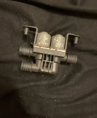 Coolant heater control valve