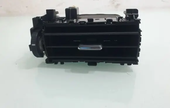 Dash center air vent grill