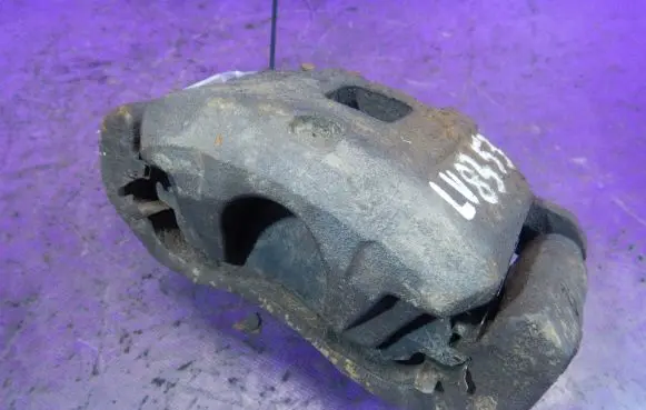 Mitsubishi Lancer VIII Front brake caliper