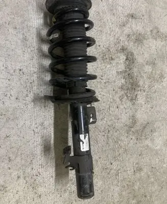 Land Rover Discovery Sport Front shock absorber with coil spring FK725310DB