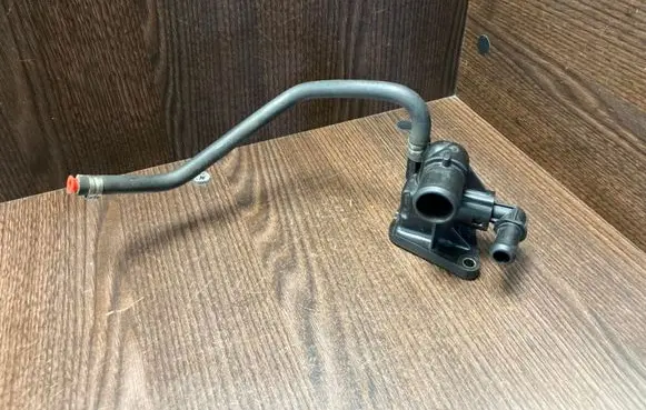 Thermostat/thermostat housing