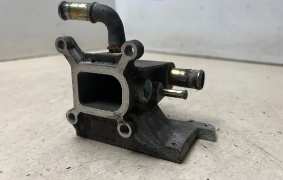 Thermostat/thermostat housing