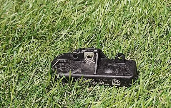 Ford Focus Tire pressure sensor DE8T1A180AA