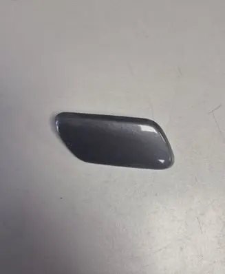 Headlight washer spray nozzle cap/cover