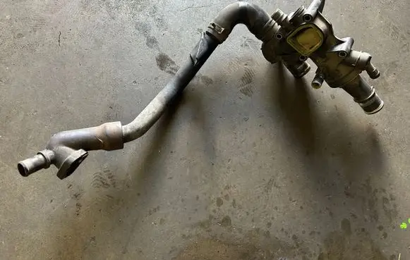 Thermostat/thermostat housing