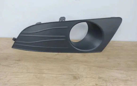 Dacia Logan I Front fog light trim/grill 8200838547