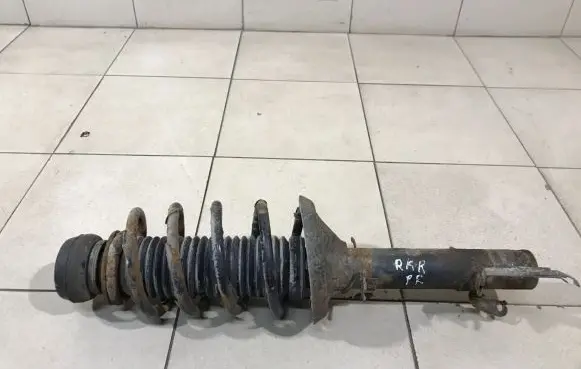 Volkswagen Golf IV Front shock absorber with coil spring