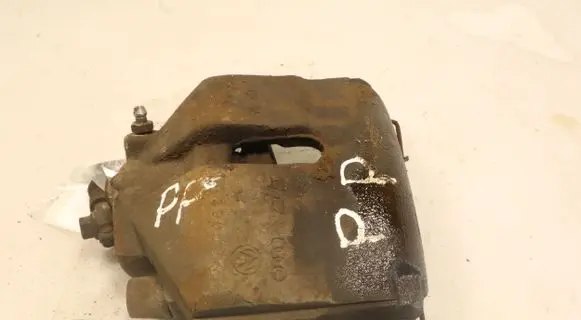 Volkswagen PASSAT B7 Front brake caliper