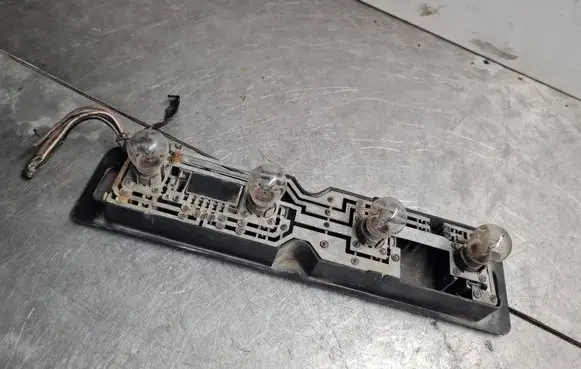 Volkswagen II LT Tail light bulb cover holder 26420