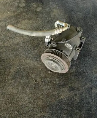 KIA Sportage Air conditioning (A/C) compressor (pump)