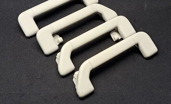 Volkswagen Touareg II A set of handles for the ceiling 7P0857643 7P0857644
