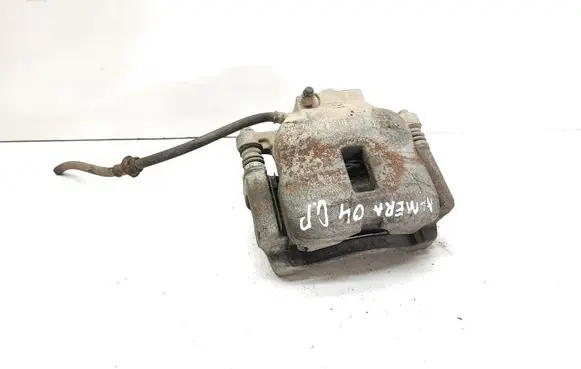 Nissan Almera N16 Front brake caliper