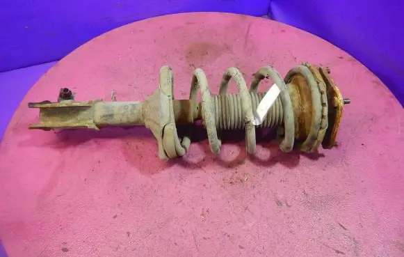 KIA Carnival Front shock absorber with coil spring