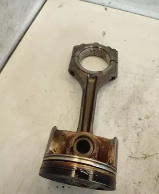 Piston with connecting rod