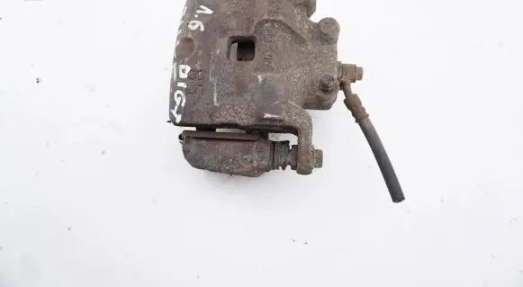 Nissan Juke I F15 Front brake caliper