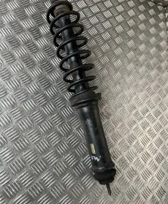 Volkswagen PASSAT B3 Rear shock absorber/damper 1H9512151B