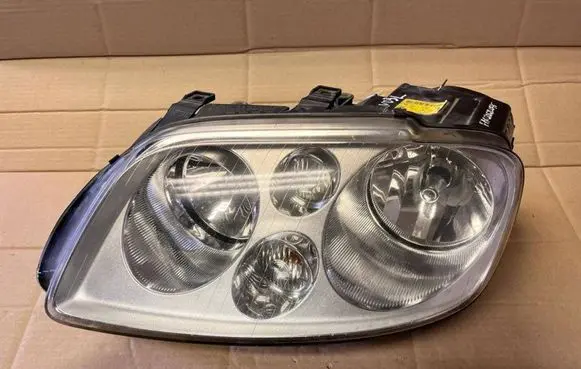 Volkswagen Touran I Headlight/headlamp 1T0941005F 0301205201