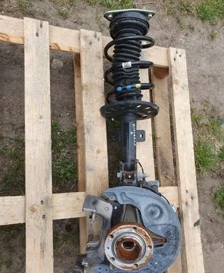 Opel Combo E Front wheel hub spindle knuckle 90998988
