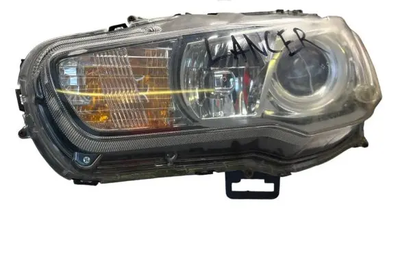 Mitsubishi Lancer VIII Headlight/headlamp P6117L 9955949700