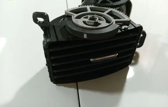 Dash center air vent grill
