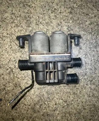 Coolant heater control valve