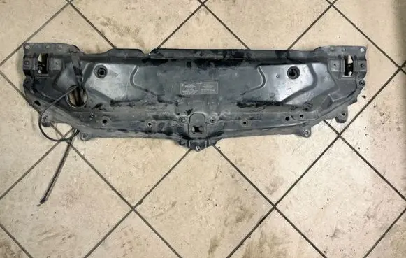 Top upper radiator support slam panel
