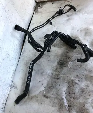 Volkswagen Touran III Engine coolant pipe/hose 04l121058am