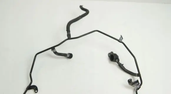 Volkswagen Golf VII Engine coolant pipe/hose 06K121075P